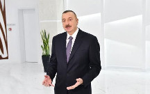 İlham Əliyev DOST Agentliyinin inzibati binasının açılışını etdi