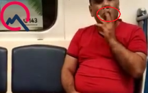 Bakı metrosunda biabırçılıq - Qatarda siqaret çəkdi+Video